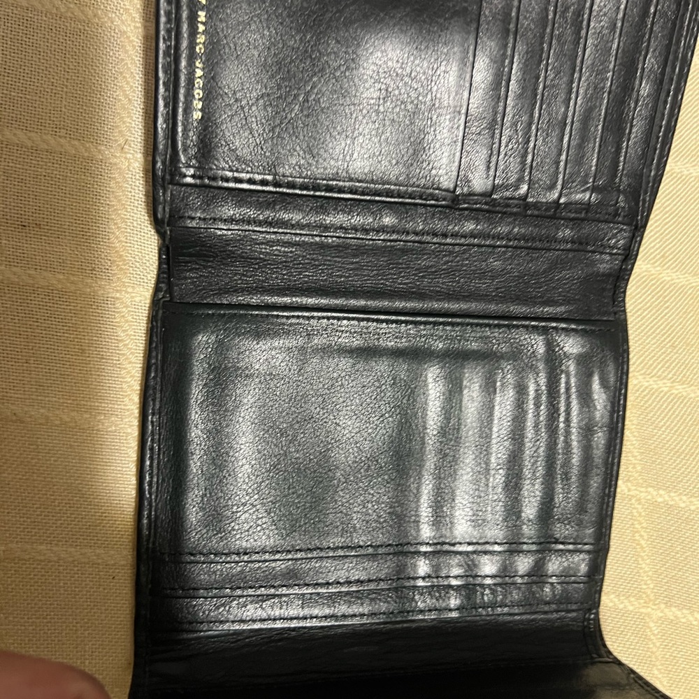 Mark jacobs/Kate spade wallet still has life left and usable